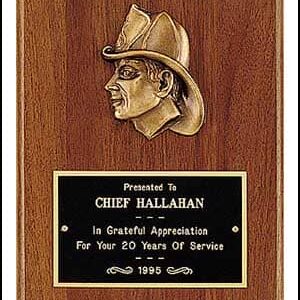 Import placeholder for 1534: Wooden plaque honoring Chief Hallahan for 20 years of service, featuring a firefighter helmet (1995).