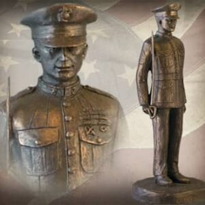 Import placeholder for 3528: Bronze statue of a saluting military officer with US flag in the background.
